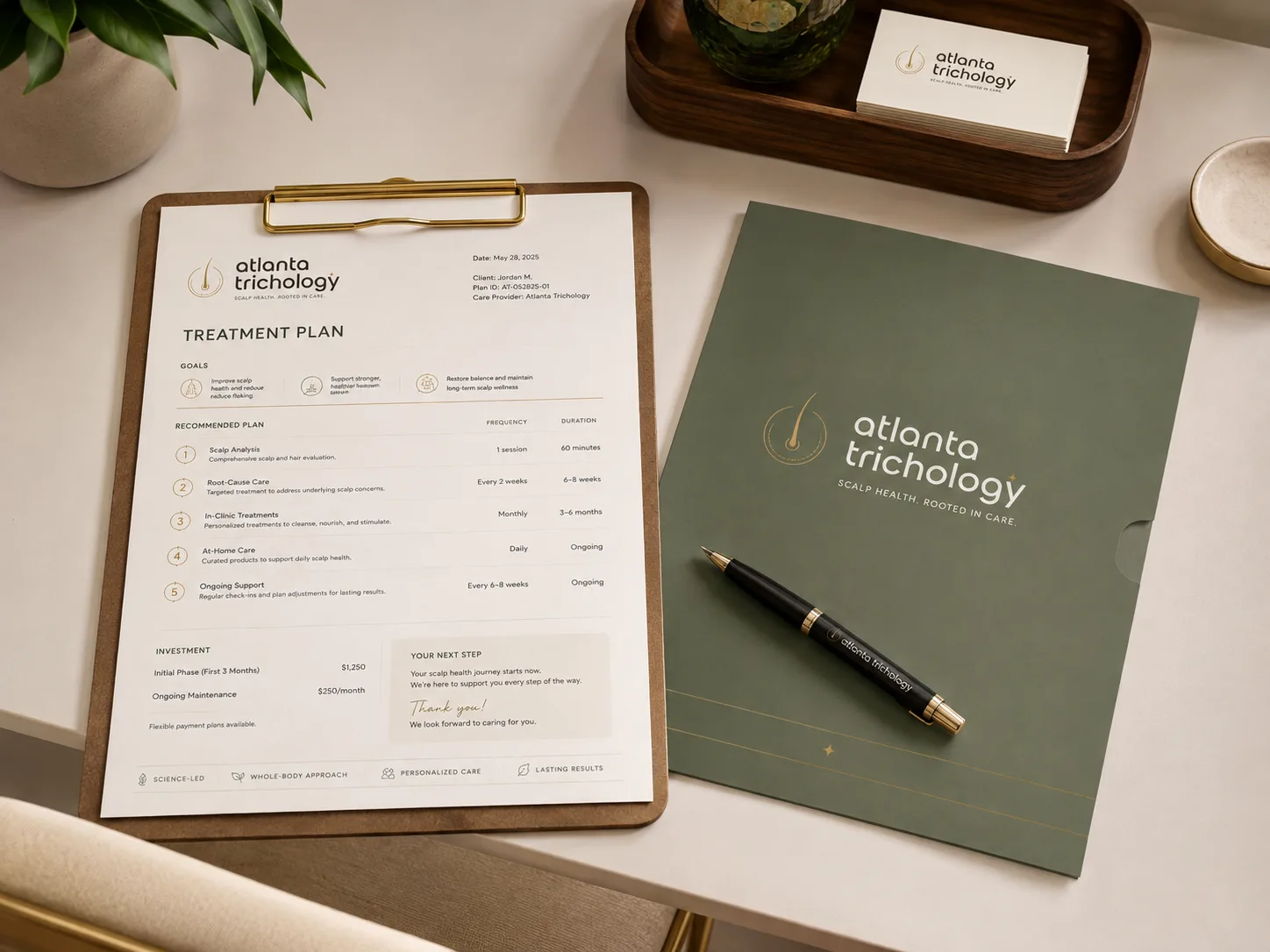 Printed Atlanta Trichology treatment plan on a clipboard